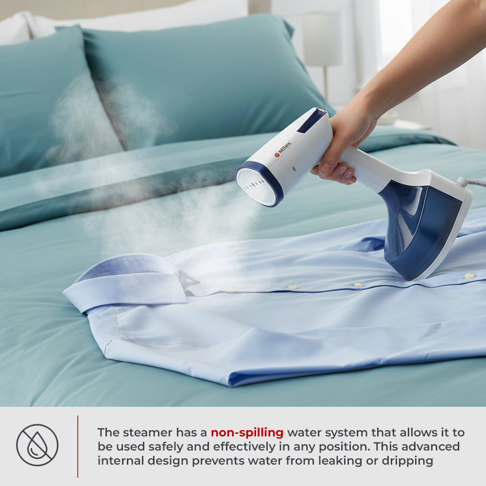 Person using a handheld steamer on a shirt on a bed with text about the steamer's non-spilling water system.