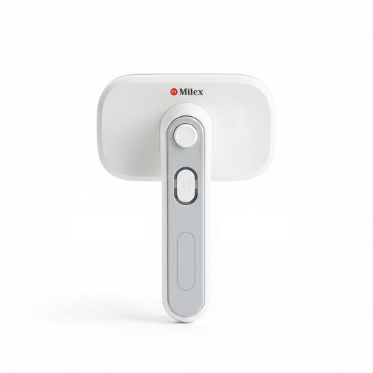 White handheld pet brush with a Milex logo on a white background