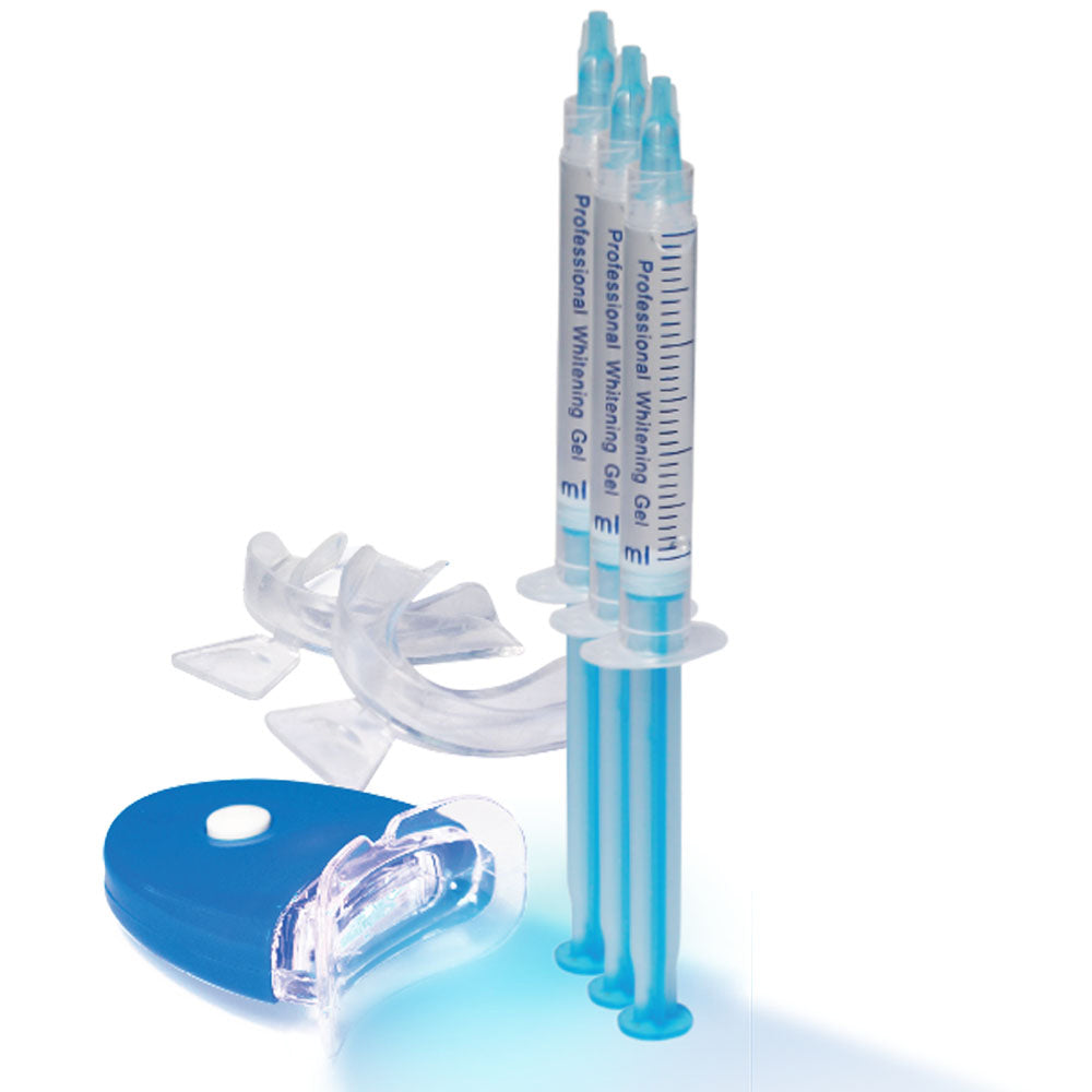 Two dental whitening gel syringes with applicators on a white background